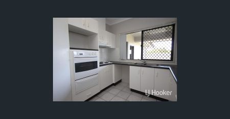 Spacious 4 Bedroom Home with Backyard Patio in Kirwan - Photo 4
