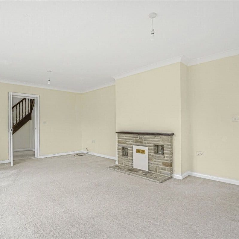 A four bedroom detached family home with driveway parking and gardens to the front and rear in Hopton. - Photo 1