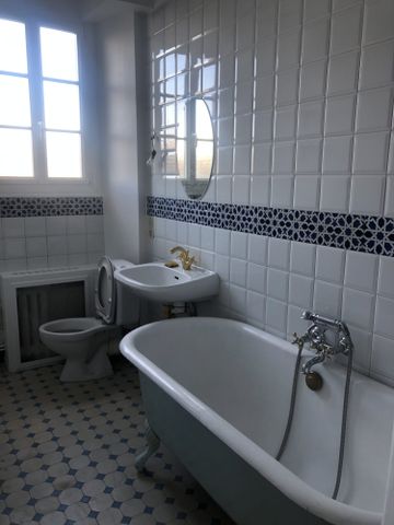 Location Appartement 4 pièces 89m² PARIS 18ème - Photo 5