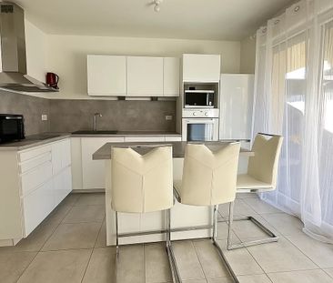Appartement T2 avec terrasse + garage et place de parking - Photo 4