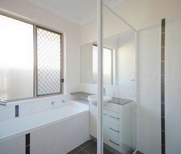 Modern 4-Bedroom Family Home Backing Onto a Peaceful Reserve - Photo 4