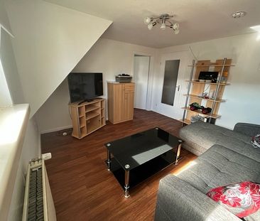 Gemütliche Dachgeschosswohnung in stadtnaher Wohnlage! - Photo 1