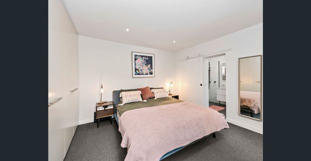 VERSATILE BAYSIDE BEAUTY WITH HUGE ENTERTAINING DECK - Photo 1