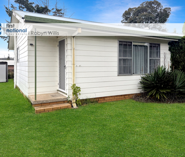 Charming 1-Bedroom Unit with Spacious Yard - Photo 3