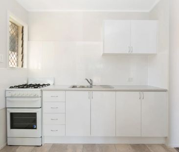 Well-Located Two-Bedroom Apartment with Carport - Photo 3