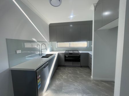 Brand New 5-Bedroom Duplex in Prime Location - Photo 2