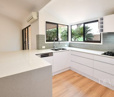 Stunning Townhouse with Oversized Courtyard - Photo 2