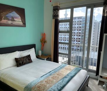 Furnished 2Bedroom Apt. with Skytower view! - Photo 2