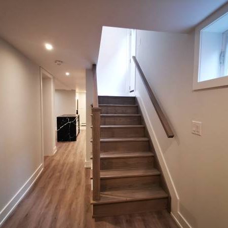 Newly renovated basement apartment w/Parking - Photo 1