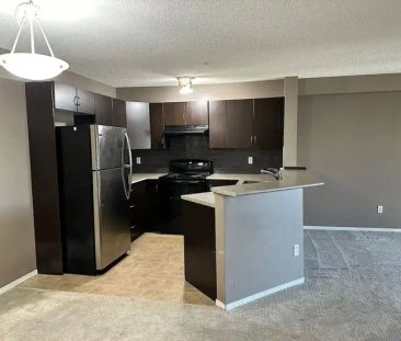 Two Bedroom Two Bathroom Panorama Condo with Parking and All Utilities Included | 60 Pantella Street NW, Calgary, AB, Calgary - Photo 1