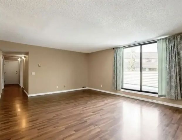 Vibrant 2 bedroom condo across from Foothills Hospital, near ACHRI and UofC | Calgary - Photo 1