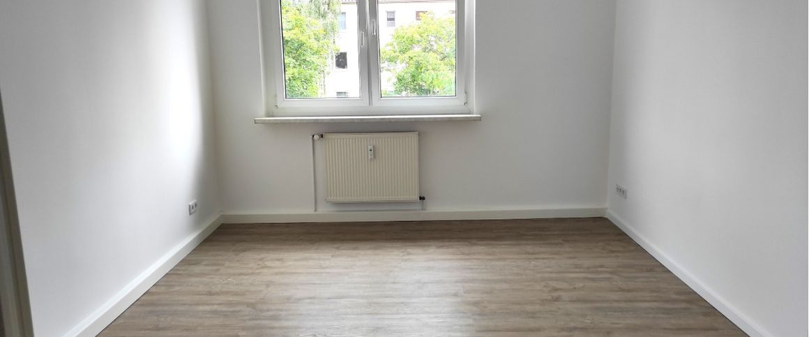 Renovierte Wohnung mit Balkon und Einbauküche - Foto 1