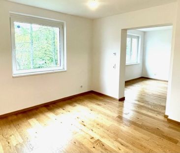 DESIGNWOHNUNG IM GRÜNEN - FÜR SINGLES UND PAARE - Foto 1