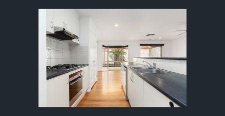 Expansive 4-Bedroom Family Home - Photo 4