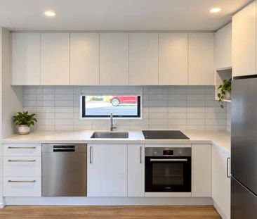 Architecturally designed 2-Bedroom 1.5 Bathroom Townhouse with Priv... - Photo 2