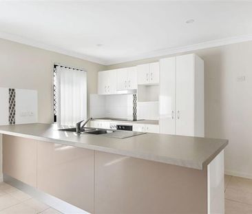 Spacious Family Home in a Peaceful, Family-Friendly Street! - Photo 4