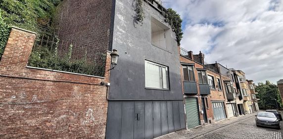 Uitzonderlijke woning te huur in Brussel voor € 2.200 met 1 slaapkamer - Photo 2