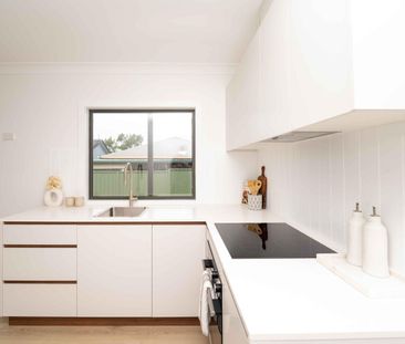 NEAR NEW, ARCHITECTURALLY DESIGNED HOME - Photo 1