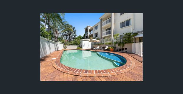 2 bed, 2 bath, 2 car ground floor apartment with pool. - Photo 1