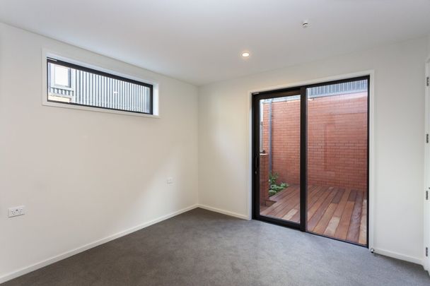 NEAR NEW spacious 2 bedroom townhouse in the city! - Photo 1