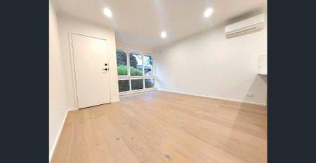 CONVENIENTLY LOCATED & STYLISH TWO BEDROOM UNIT - Photo 2