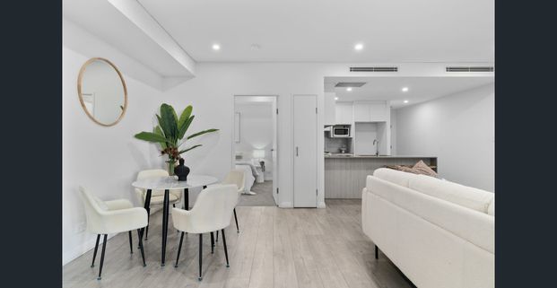 Sunlit Three-Bedroom with Entertainer's Balcony - Photo 1