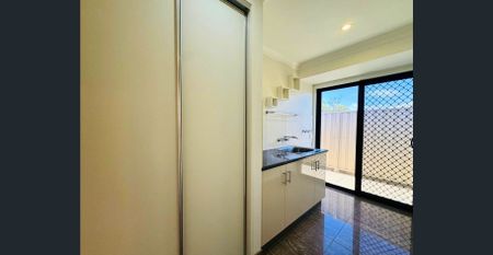 MODERN 4-BED, 2-BATH FAMILY HOME WITH EXPANSIVE ENTERTAINMENT AREA AND POWERED SHED! - Photo 4
