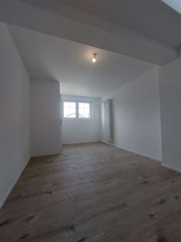 Appartement de 2,5 pièces au 2ème étage avec jardin commun - Photo 3