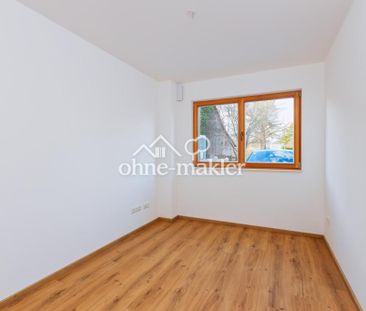 großzügig geschnittene 3-Zimmer-Wohnung mit Garten! - Photo 2