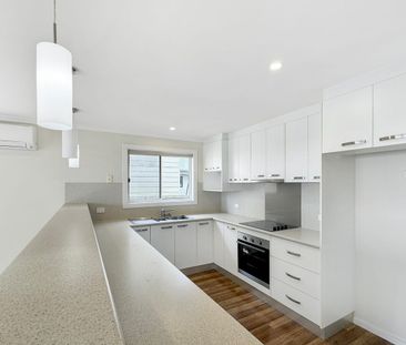 Three Bedroom Home with Low Maintenance Living - Photo 6