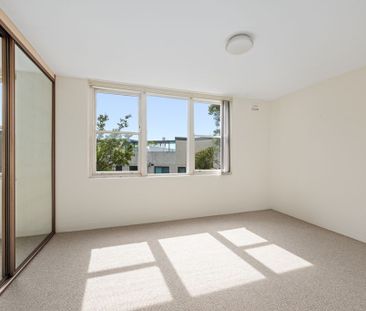 Stylish Coastal Living in Boutique Block of Nine - Photo 1