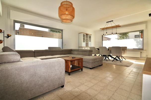 Mooie half-open bebouwing met 3 slpks, garage en tuin voor 975 EUR/mnd - Foto 1