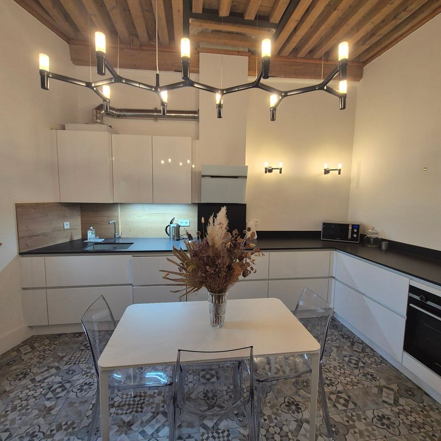 CROIX-ROUSSE - SUPERBE APPARTEMENT RENOVE TYPE 3 - Photo 1