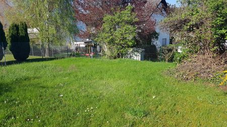 Schuch Immobilien – Kuschelige Dachgeschoßwohnung mit Gartennutzung - Foto 2