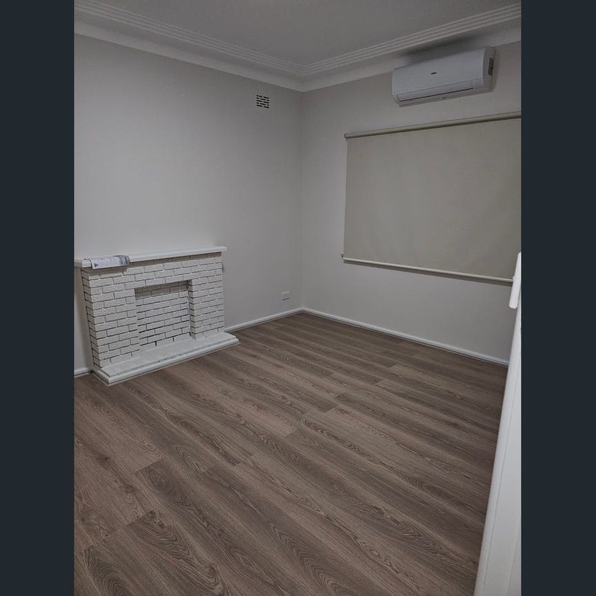 NEWLY RENOVATED DELIGHT! - Photo 1