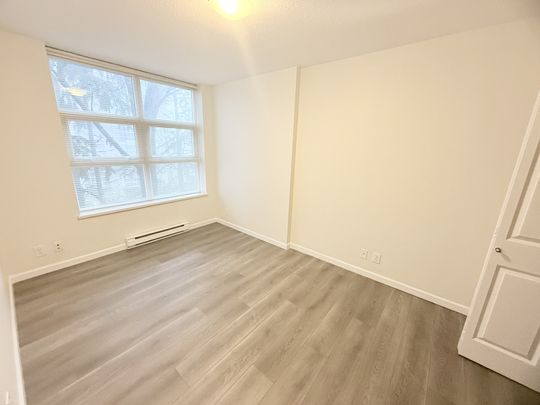 Spacious and Bright Two Bedroom Home in Serene Burnaby Mountain By SFU - Photo 1