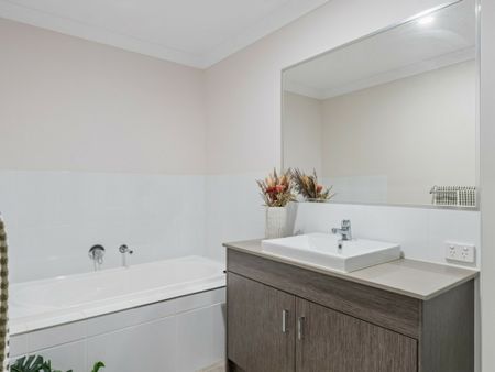 Modern 3-Bedroom Home with Vintage Furniture � Lawn Maintenance Included - Photo 3