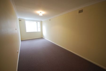 First Floor 2 Bedroom Unit in a Convenient Location! - Photo 4