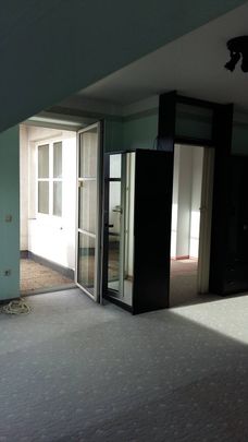 Helle 2 Zimmer Dachgeschosswohnung mit Loggia und zugehörigen Stellplatz - Foto 1