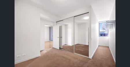 Unfurnished Two-Bedroom I Swimming Pool & Gym - Photo 2