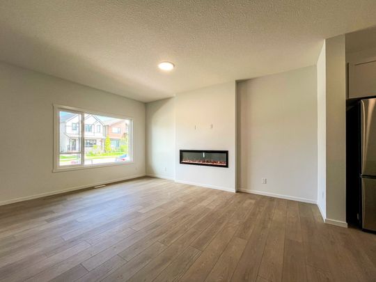 Brand New 3 Bed + Den Family Home | The Orchards | Double Garage | Clubhouse Access - Photo 1