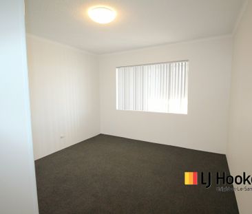 VERY SPACIOUS, RENOVATED 2 BEDROOM APARTMENT WITH TANDEM GARAGE - Photo 1