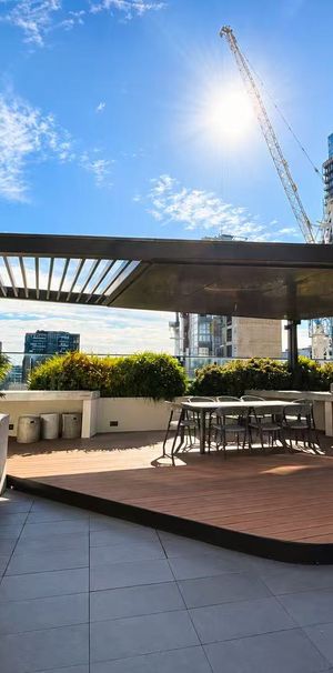 Furnished 2-Bedroom Apartment with Car Space in the Heart of Melbourne - Photo 1