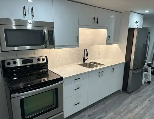 Beautifully renovated basement suite | 828 94 Avenue Southwest, Calgary - Photo 1