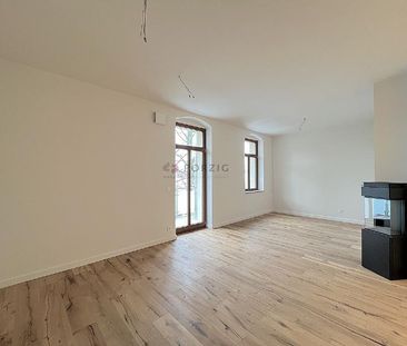 Erstbezug mit Stil: 2-Raum-Traum mit Kamin & Balkon - Photo 2