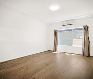 Spacious 3-Bedroom Home in a Prime Merrylands Location - Photo 4