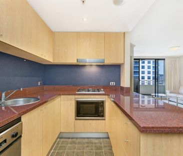 Freshly Painted One-Bedroom + Study Apartment with City Views - Photo 3