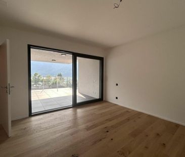NUOVO ATTICO 3.5 LOCALI CON ROOFTOP DI 38MQ VISTA LAGO - Photo 3