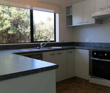 Charming Three-Bedroom Brick and Tile Home - Photo 3