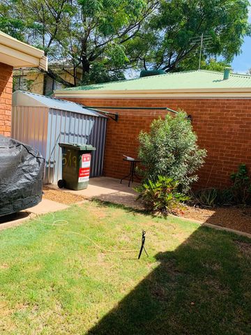 FULLY FURNISHED SECURE UNIT IN THE CBD! - Photo 2